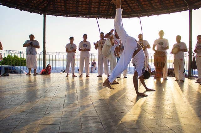 Men practising Capoeira dance martial art
